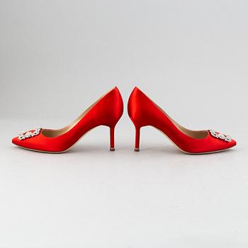 Manolo Blahnik, a pair of red satin 'Hangisi' shoes, 2020, size 38½.