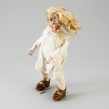 A mechanical bisque head doll by Heubach, probably 7669, Germany, c. 1912.