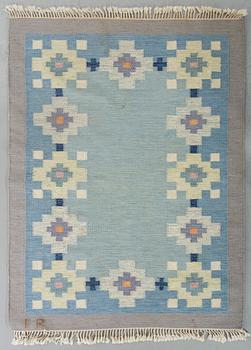 A signed flat weave carpet ca 195 x 139 cm.
