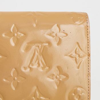 Louis Vuitton, a 'Sarah' vernis wallet.