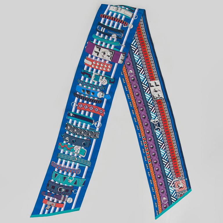 Hermès, a 'Collier de Chiens Maxi Twilly' silk scarf.