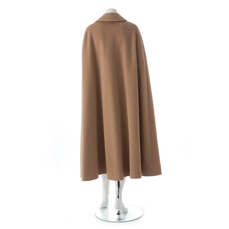 CÉLINE, a beige wool blend cape.