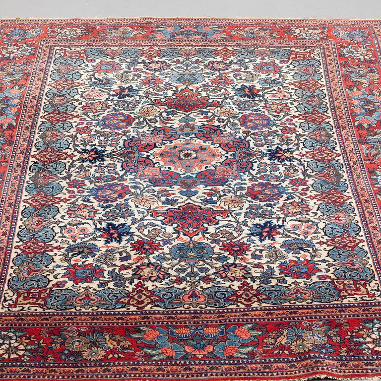 A RUG, semi-antique Kashan, around 205 x 140 cm.