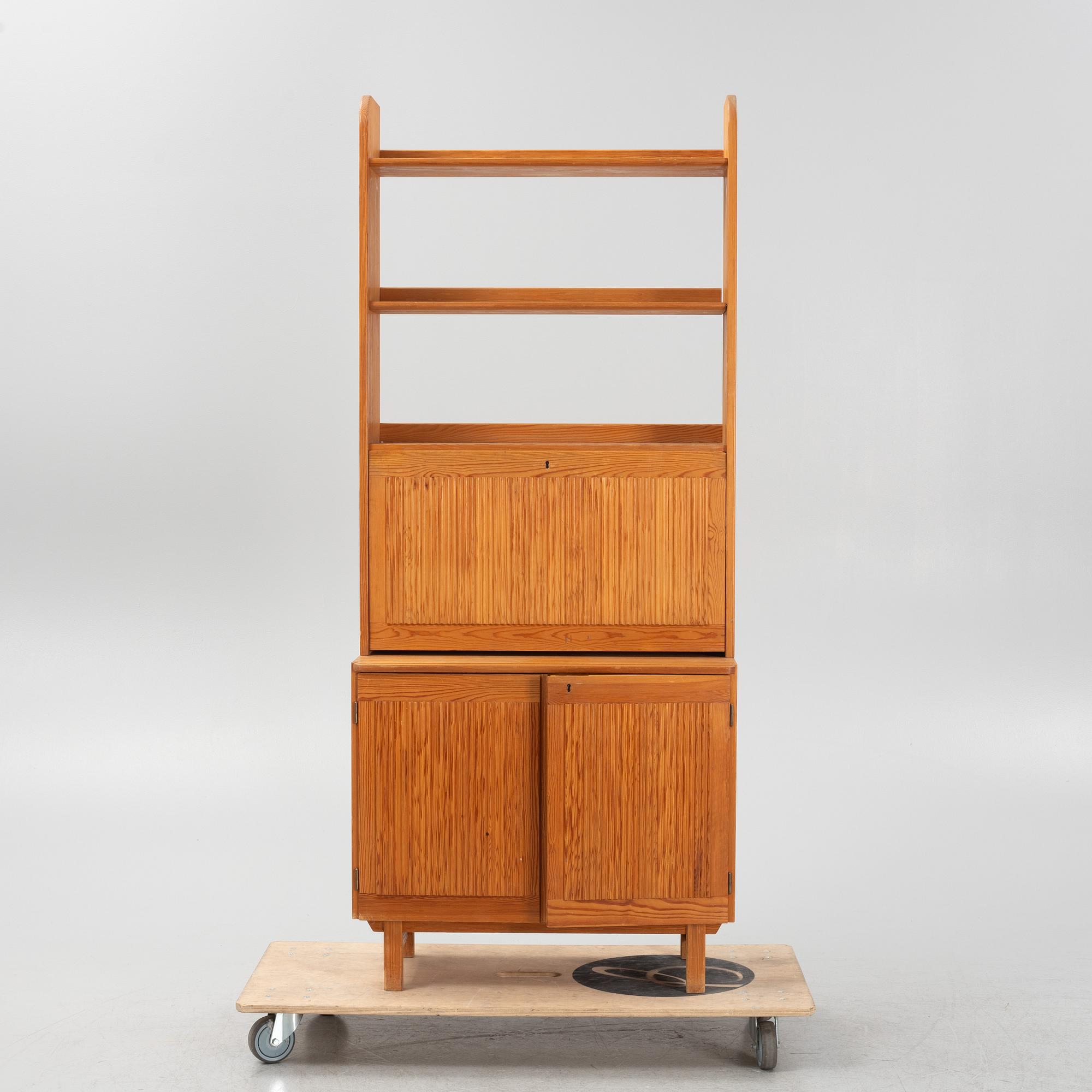 Göran Malmvall, a pinewood book case with secretaire and cabinet, second part of the 20th Century.