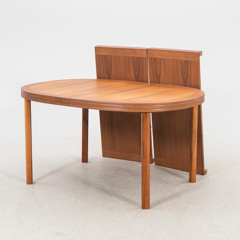 A 1960s walnut Skaraborgs möbelindustri dining table.