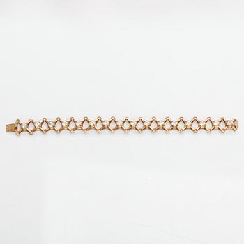 A 14K gold bracelet with synthetic spinels. Pentti KEvätlahti, Turku 1969.