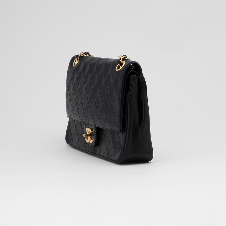 CHANEL, a blue leather "Flap Bag".