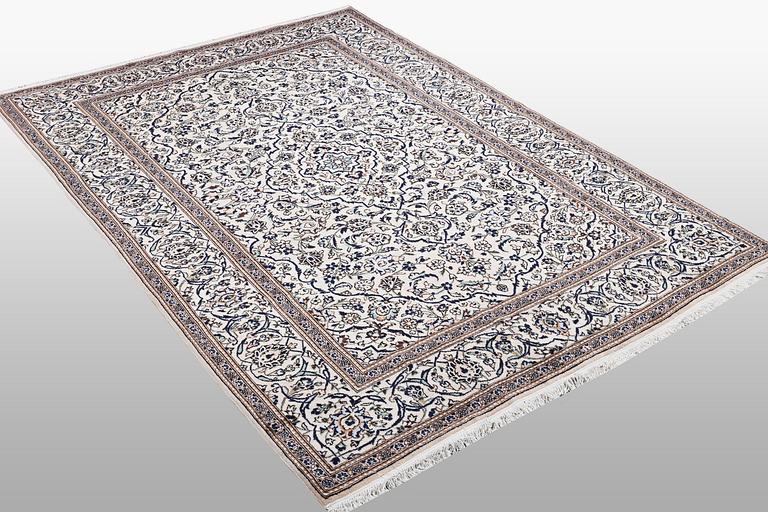A carpet, Kashan, ca 300 x 199 cm.