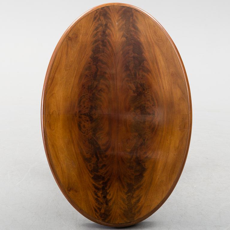 A mid 19th century mahogny table.