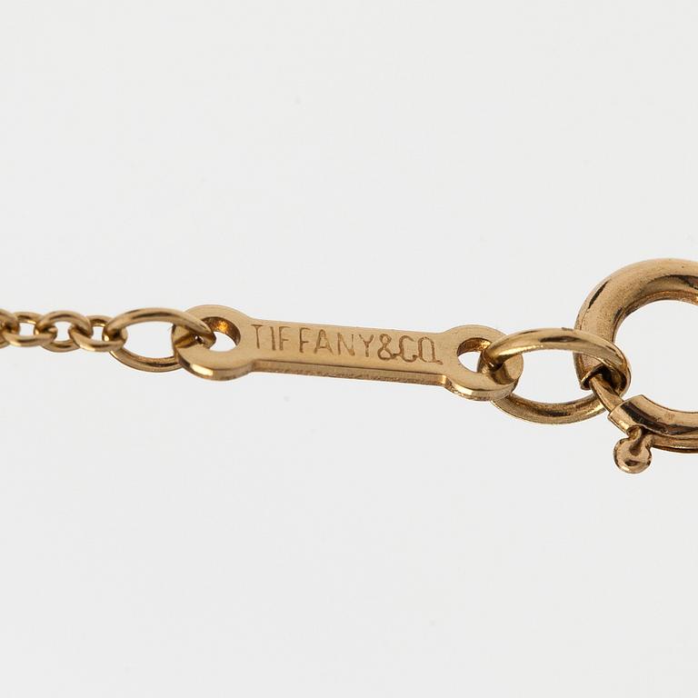 Tiffany & Co, Paloma Picasso, an 18K gold "Loving Heart" necklace.