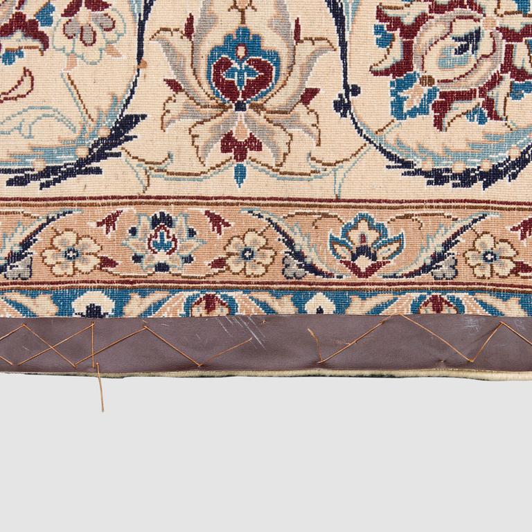 A carpet, Nain, part silk S.K 9LAA. Circa 352x248 cm.