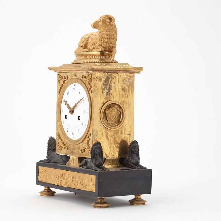 A French Empire early 19th century mantel clock.