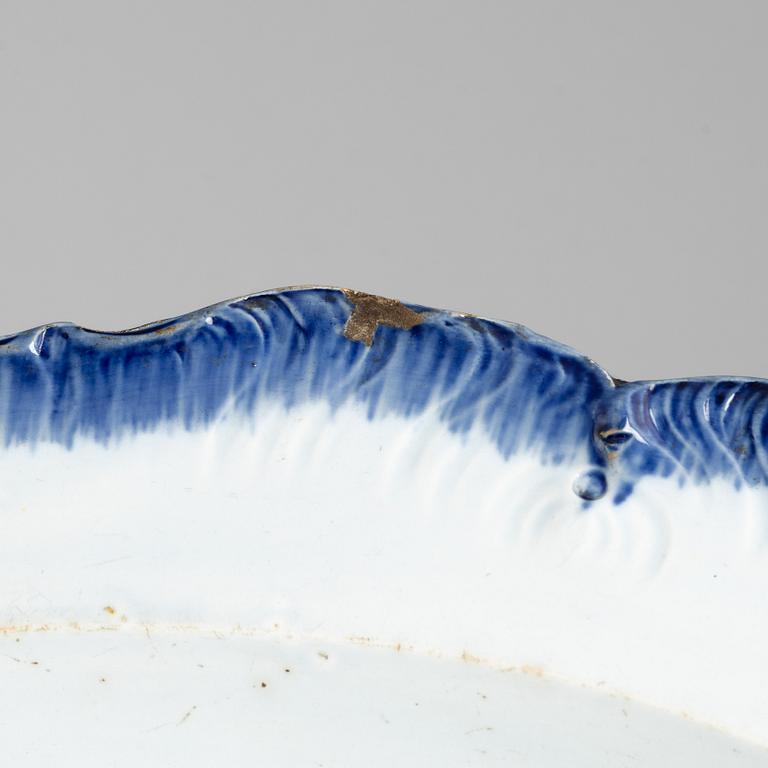 A Rococo earthenware serving dish, 18th century.