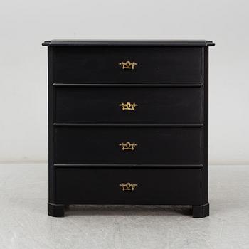 A painted chest of drawers, late 19th Century.