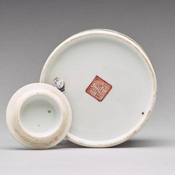 A famille rose 'bapo' teapot with cover, late Qing dynasty, Tongzhi (1862-74), mark and period.
