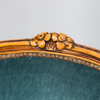 A pair of Louis XV style armchairs, mid-20th century.