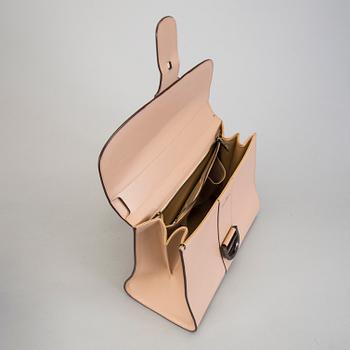 A Delvaux "Brillant" ladies handbag in nude/biscuit colored leather.