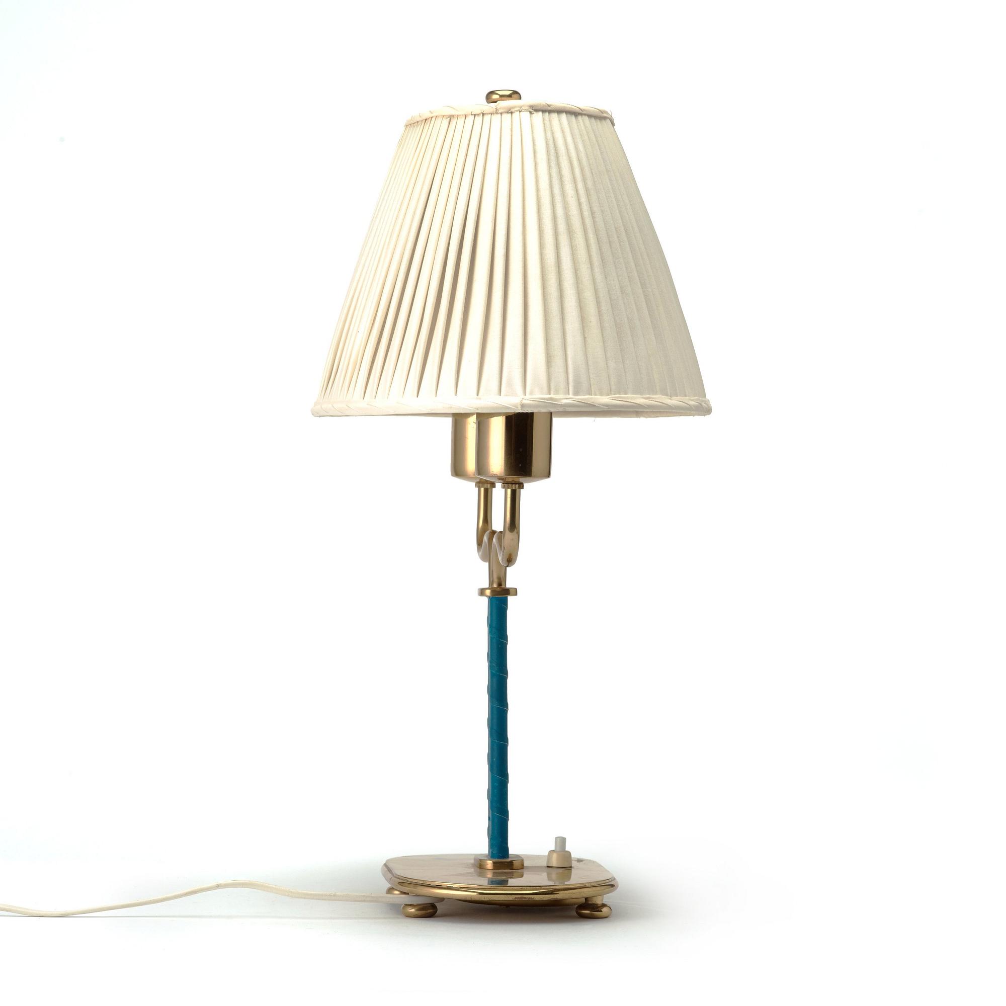 Josef Frank, a brass and blue leather table lamp, Svenskt Tenn, Sweden, model 2388.