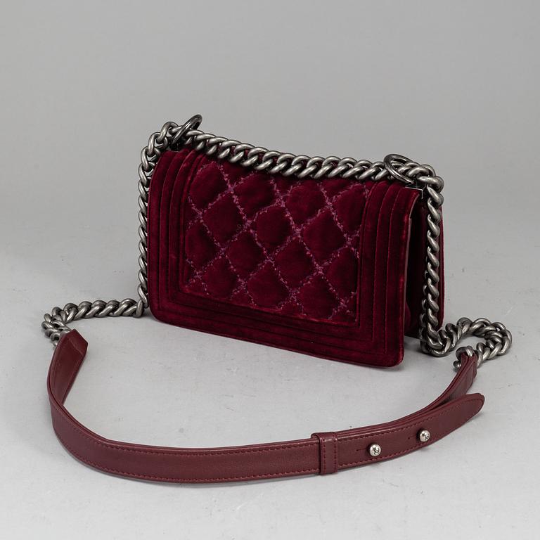 CHANEL, a burgundy quilted velvet 'Small Boy Bag'.