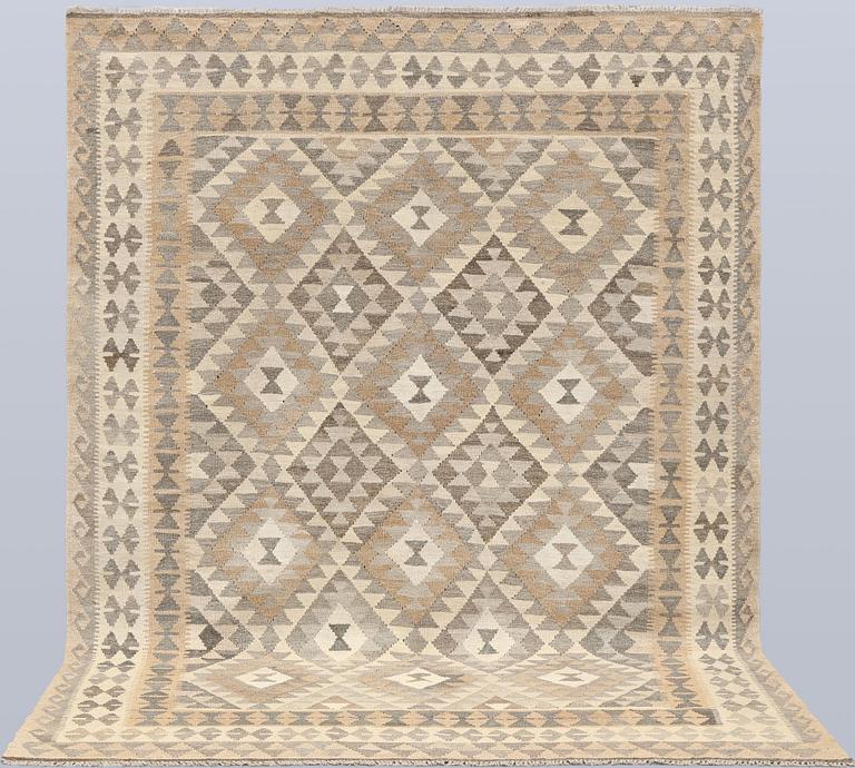 A Kilim rug, approx. 296 x 183 cm.