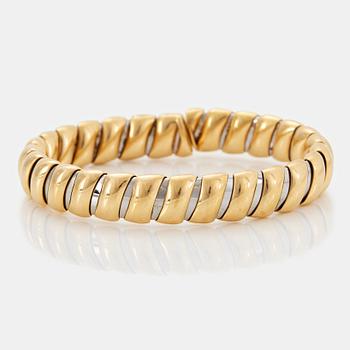 1048. A Bulgari bracelet in 18K gold and steel.