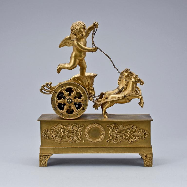 An 19th Century empire style bronze clock.