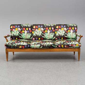 A Josef Frank model 2211 sofa, second half of the 20th century, for Firma Svenskt Tenn, designed 1956.