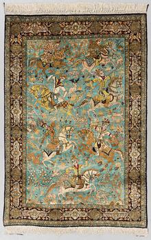 A RUG, an old silk Qum figural, ca 154,5 x 107,5 cm.