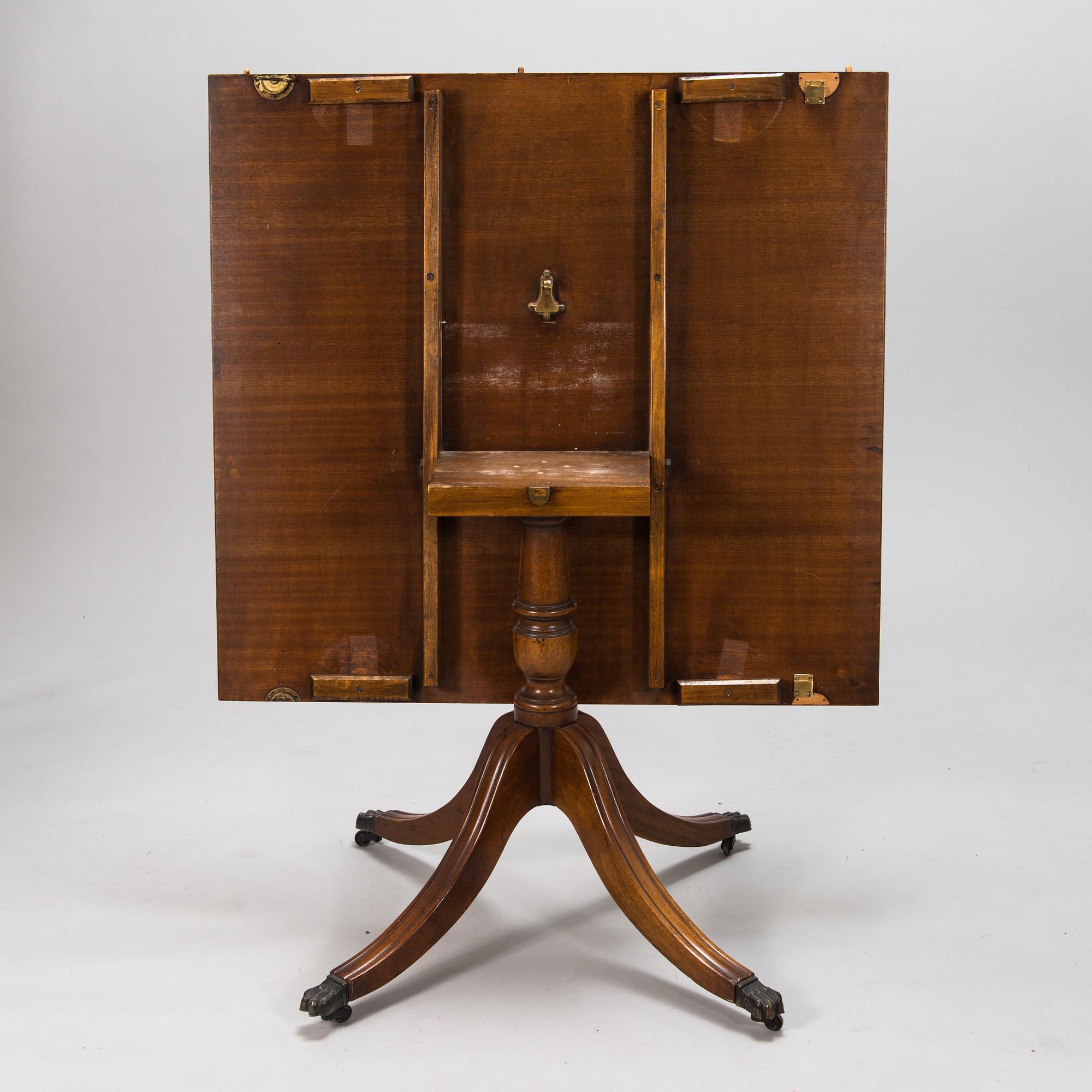 A 20th century English style dining table.