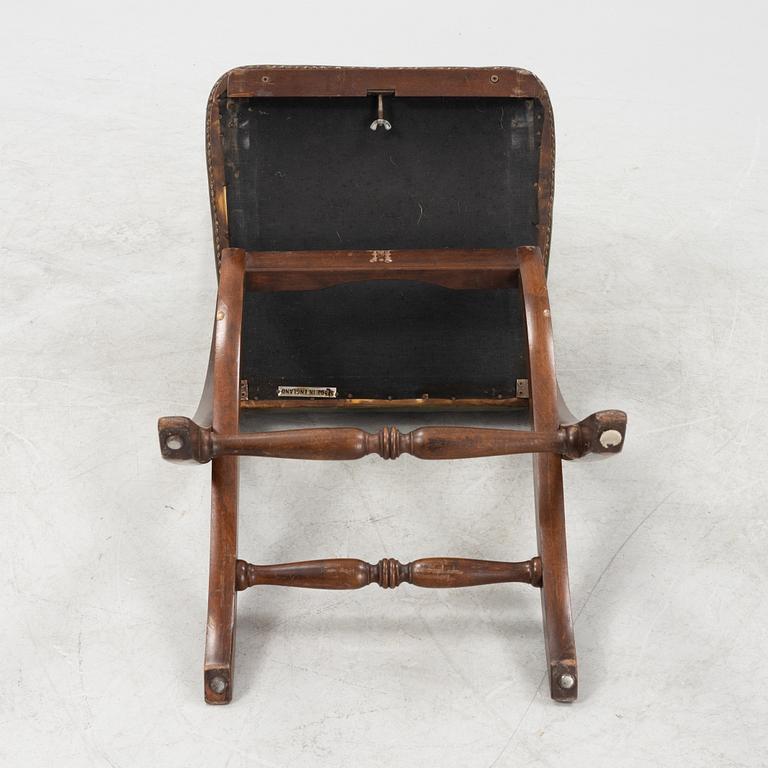 A set of five mahogany and leather upholstered chairs, England, second half of the 20th Century.