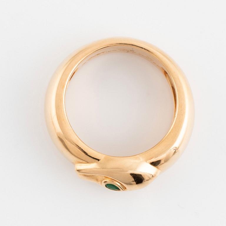 An 18K gold Cartier ring set with a tsavorite.