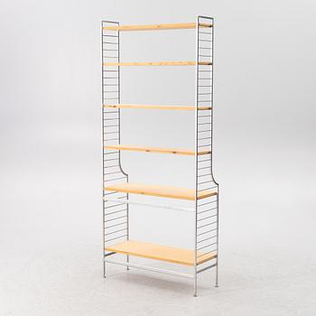 Nils Strinning, stringhylla, "Continental" 1900-talets mitt.