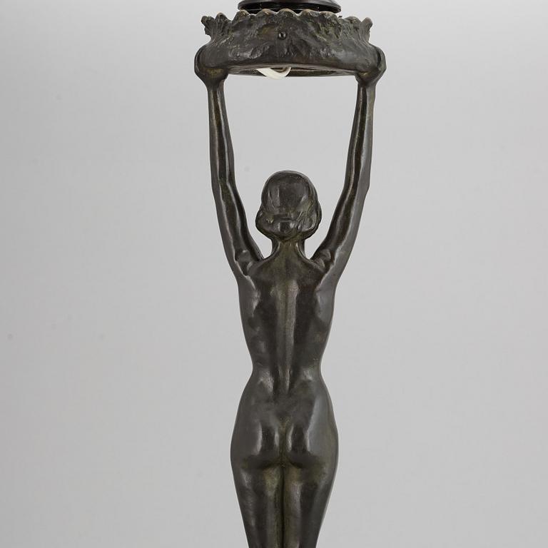 GERDA SPRINCHORN, an Art Nouveau green patinated bronze lamp "The Sun", Herman Bergman, Stockholm, early 20th century.