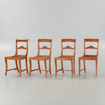 Three + one chairs from the mid 19th century.