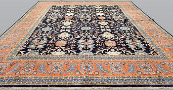 A Heris carpet, approx. 480 x 341 cm.