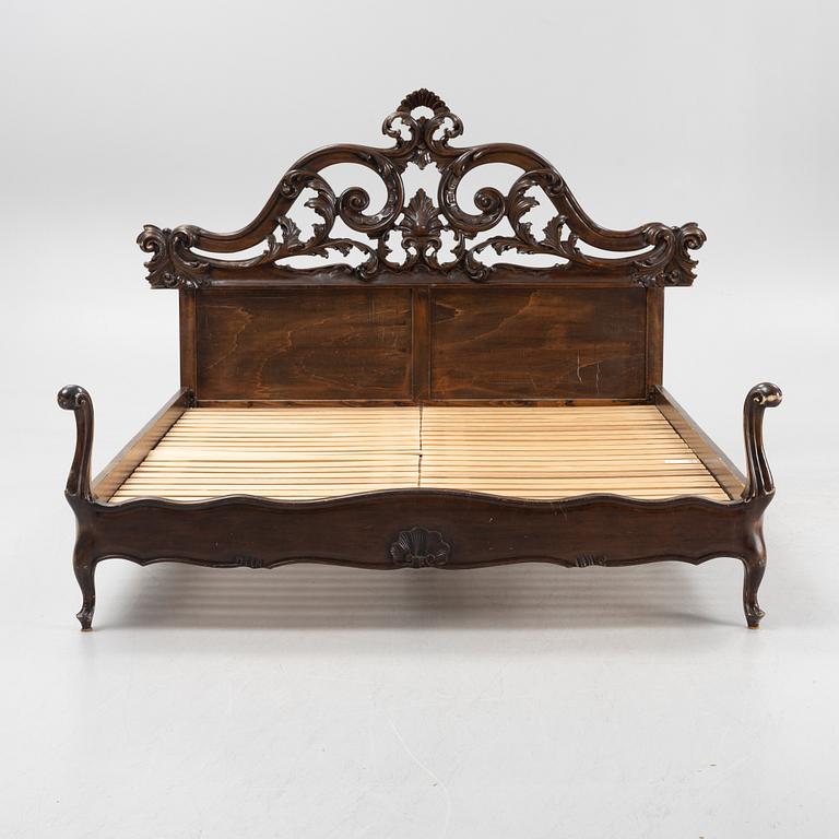 A rococo style bed frame, around 1900.
