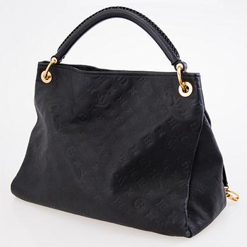 LOUIS VUITTON Black Monogram Empreinte Artsy MM Bag.