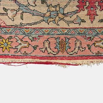 A Tbriz carpet of Safavid 'vase' design, approx. 397x295 cm.