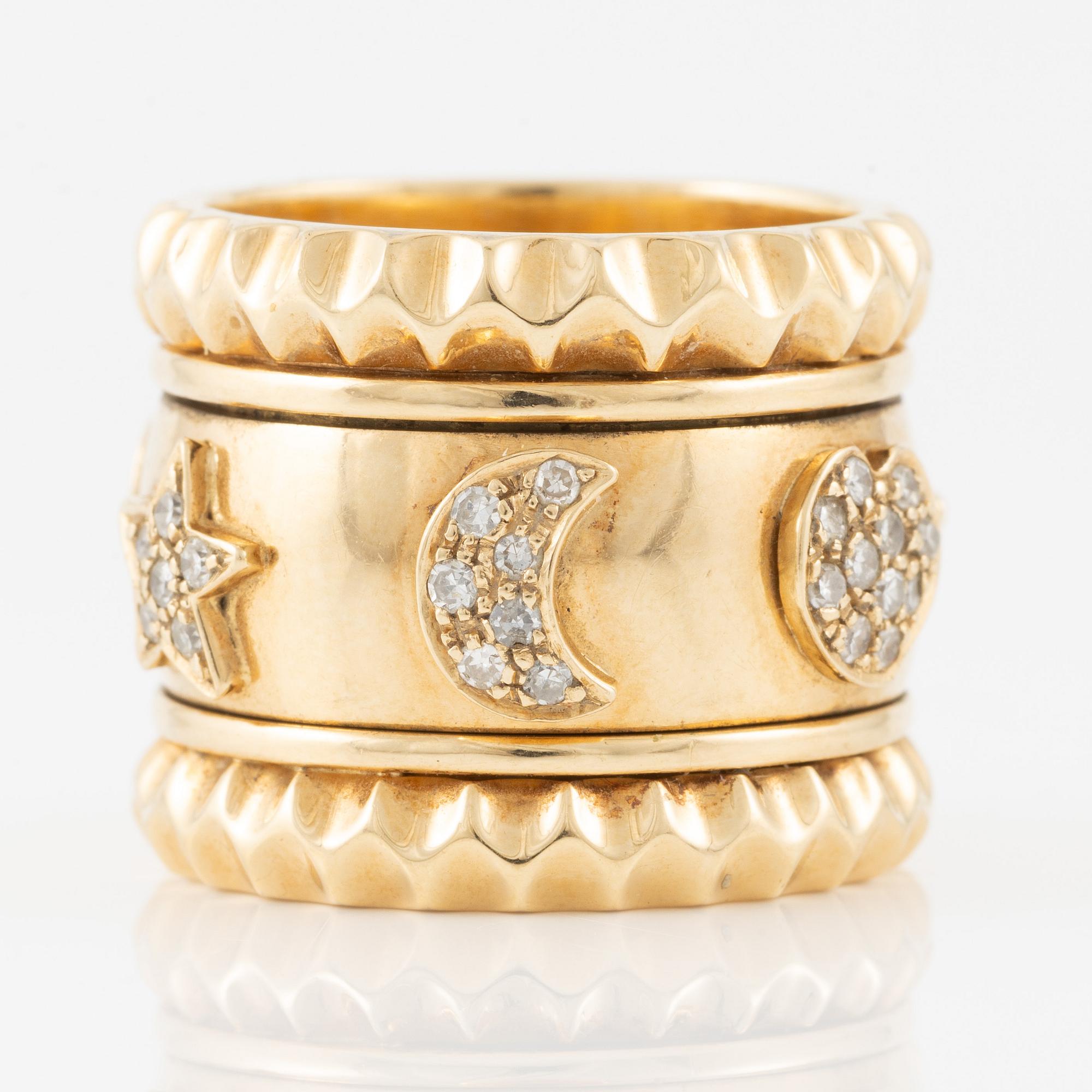 Ring in 18K gold with eight-cut diamonds, decorated with stars, hearts, and moons.
