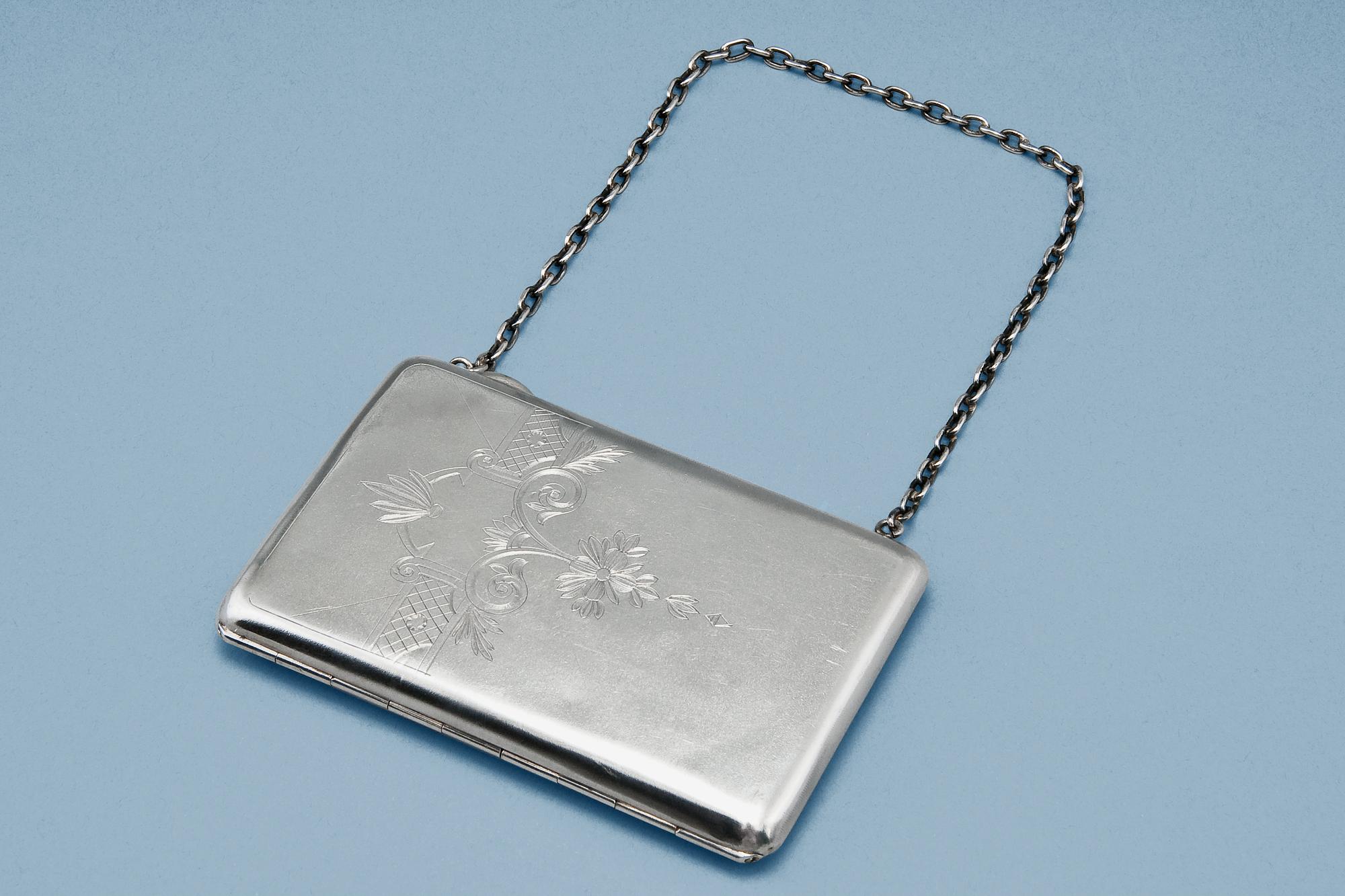 A SILVER PURSE.