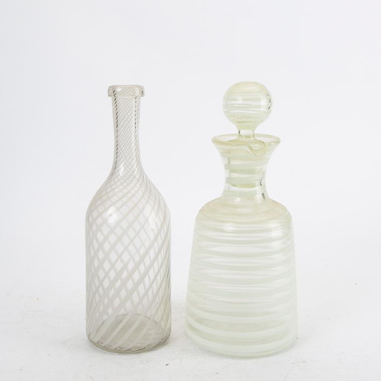 A set f two Italian mid 1900s glass decanters.
