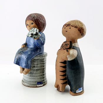 Lisa Larson, two figurines "Blomsterflicka" and "Pelle", Gustavsberg glazed stoneware.