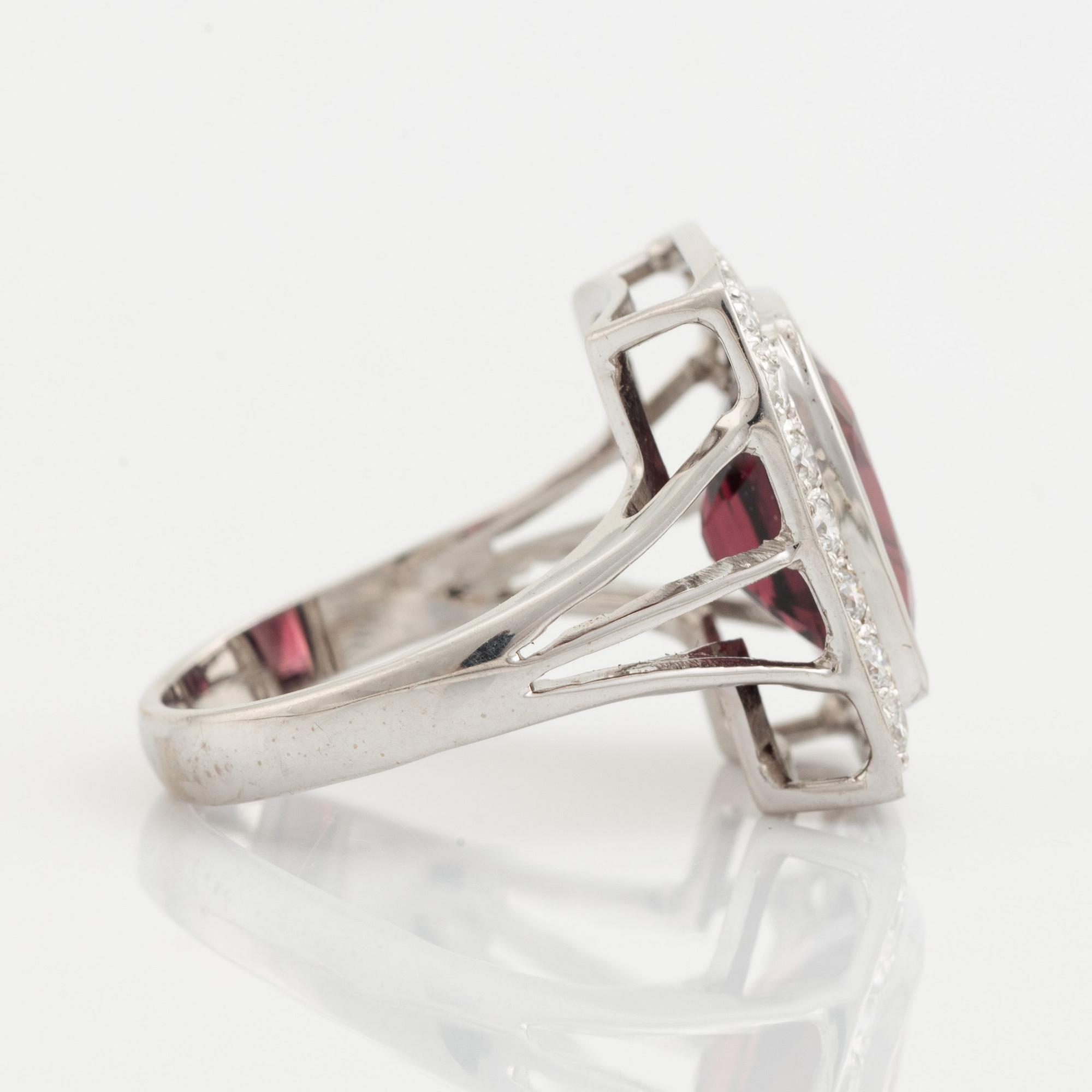 Red spinel and brilliant cut diamond cocktail ring.
