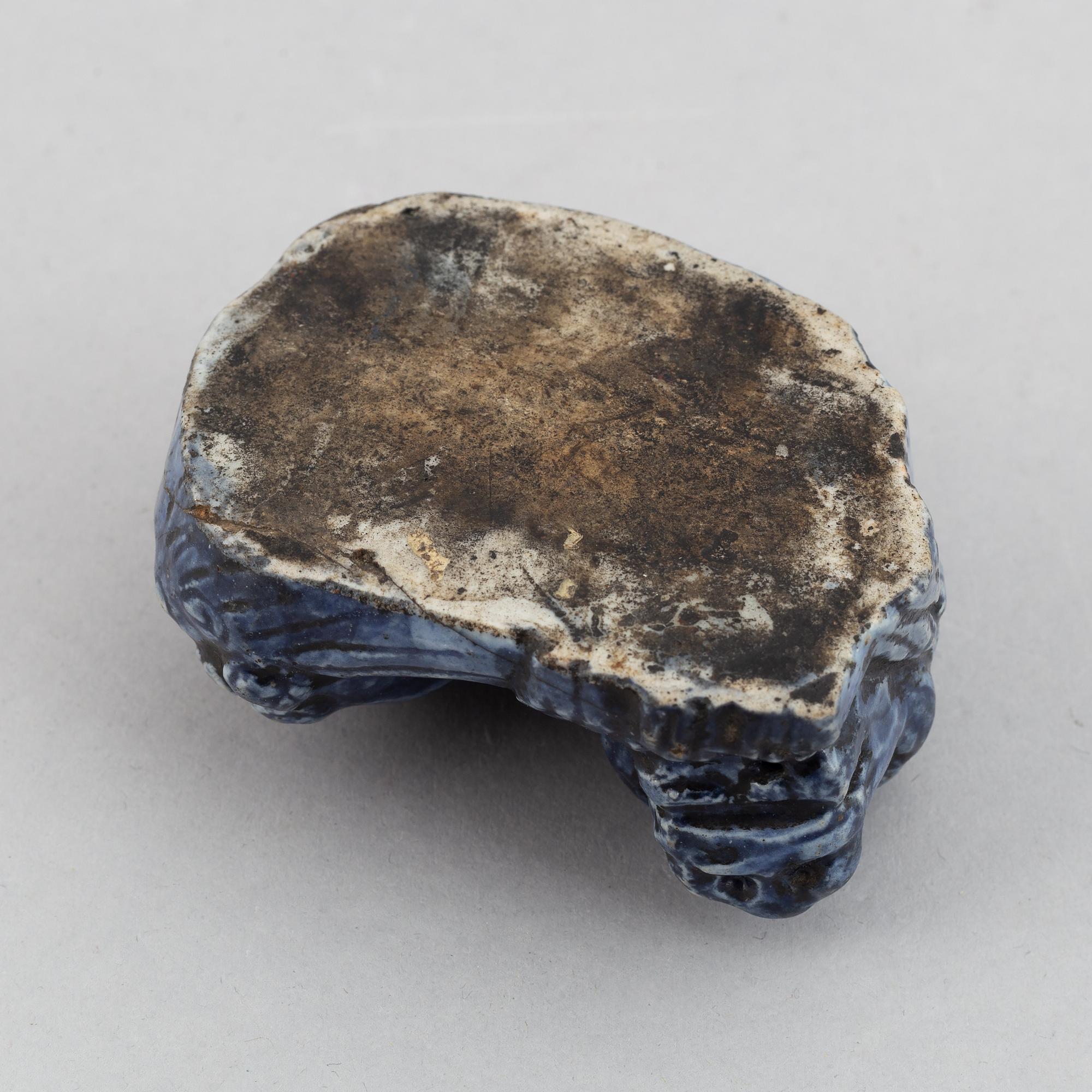 A blue glazed figure of a buddhist lion, Qing dynasty, Qianlong (1736-95).