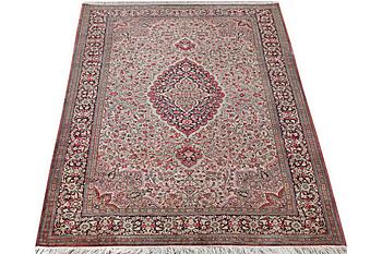 A silk Quum rug, c. 220 x 135 cm.