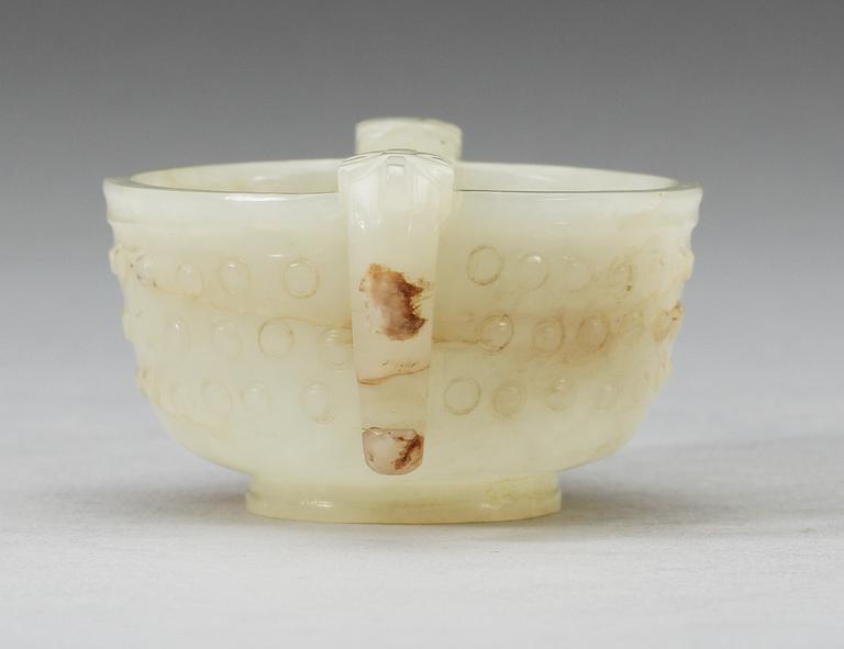 A archaistic nephrite wine cup, Qing dynasty.