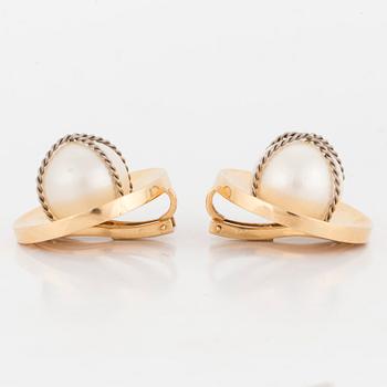 EAR CLIPS, one pair, 18K gold and white gold with cultured South Sea pearls.