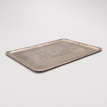 A Persian silver tray, mark of Vaspour, silver mark 84.