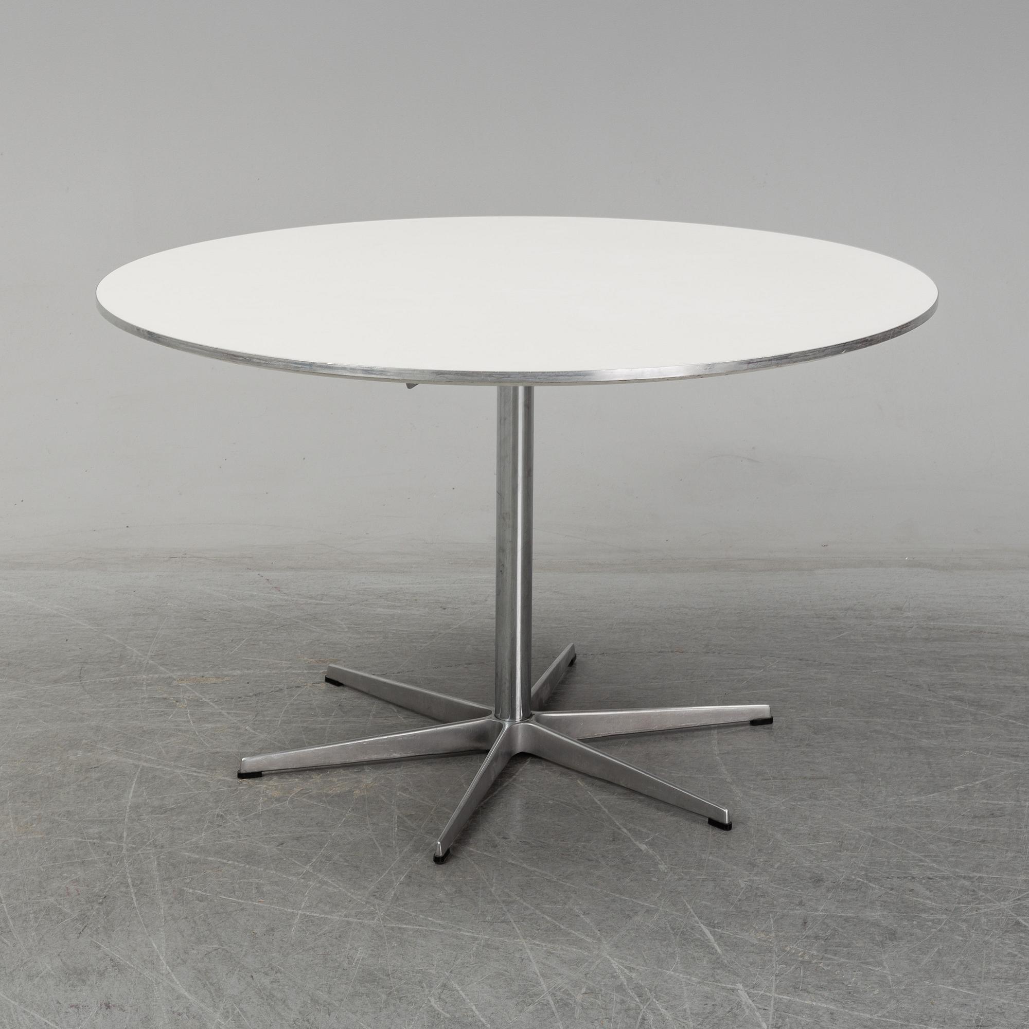 ARNE JACOBSEN, a table from Friz Hansen, Denmark, 2002.