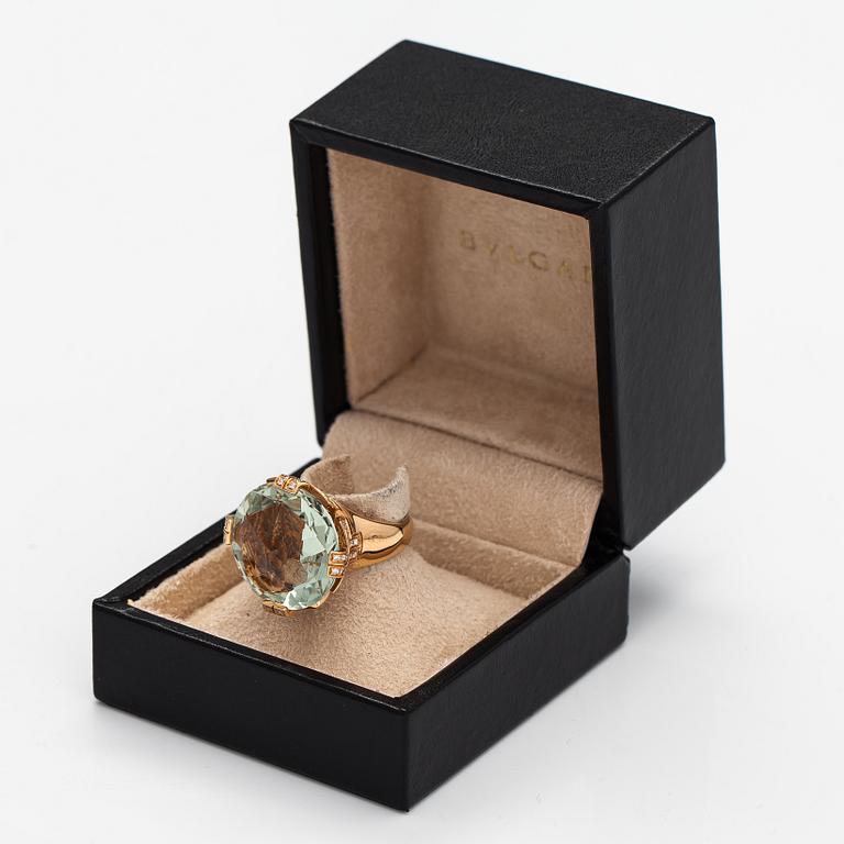 Bulgari, An 18K gold ring "Parentesi" with a green quartz and ca. 0.70 ct of brilliant cut diamonds in total.